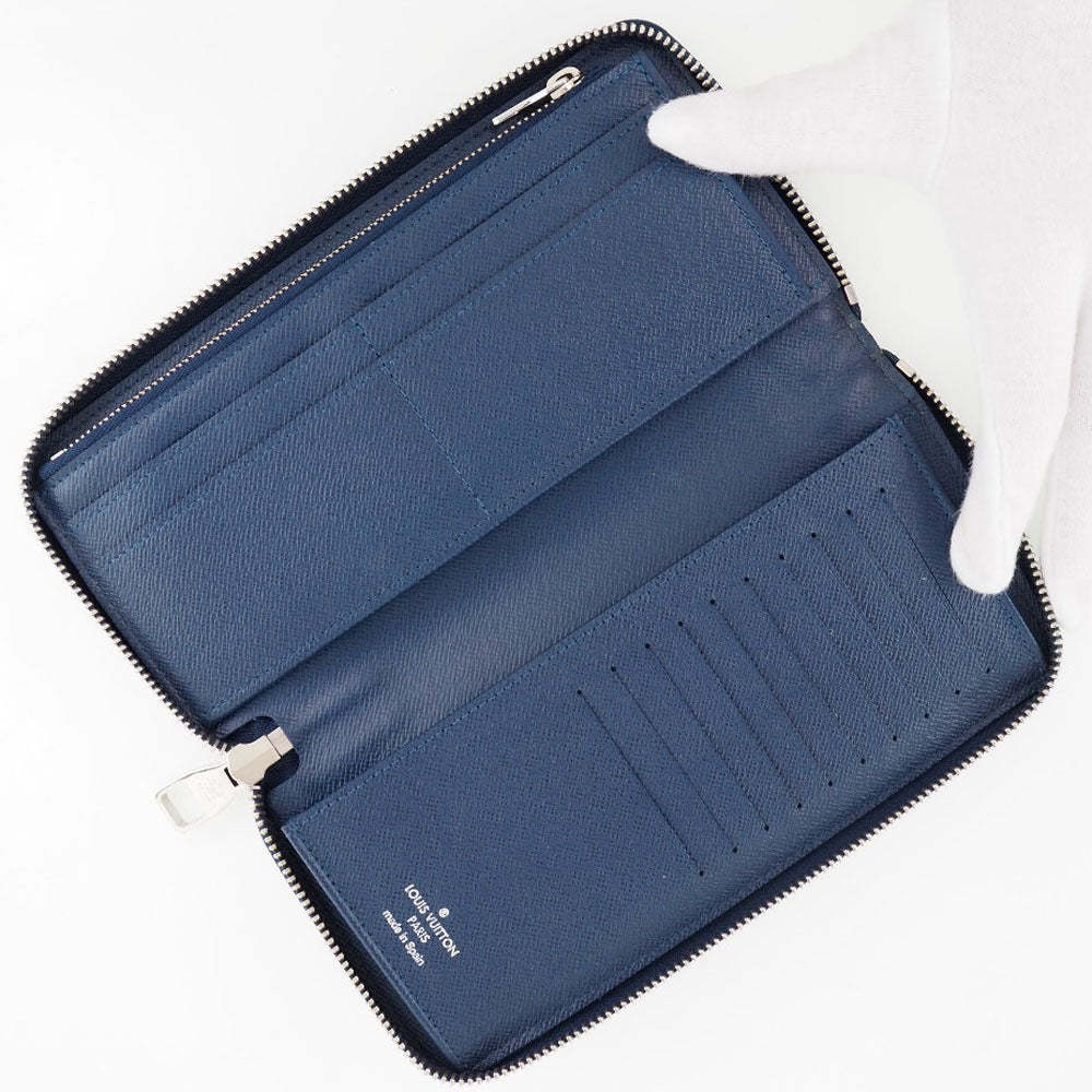 LOUIS VUITTON Portefeuille zippy Wallet - Picture 1 of 11